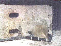 An underpan scraper after 25 months work.