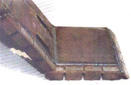 A view of a new scraper showing how the strps are welded.